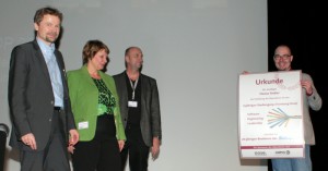 Verleihung des Stipendiums Software Engineering Leadership durch Tim Weilkiens (oose), Susanne Herl (Sigs Datacom), Thorsten Janning (Chefredakteur OBJEKTSpektrum)